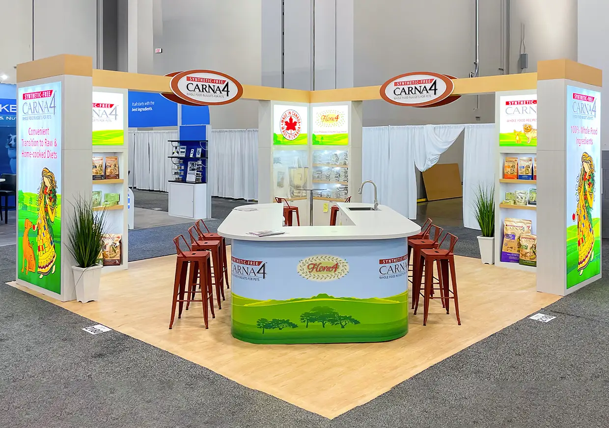 Front view of CARNA4 booth with colorful illuminated product displays
