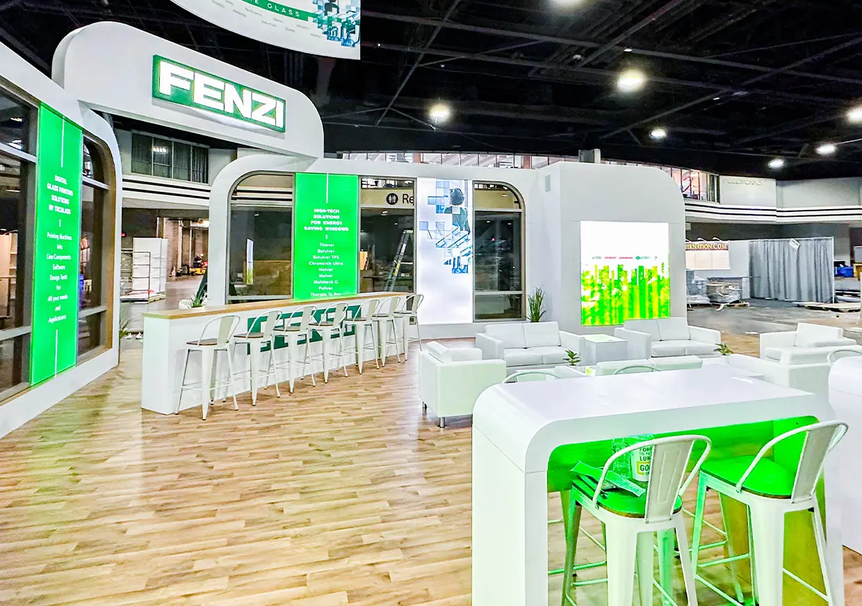 Wide view of Fenzi exhibition booth with lounge and bar seating