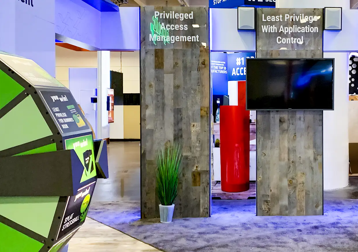 Thycotic booth display highlighting privileged access management security solutions